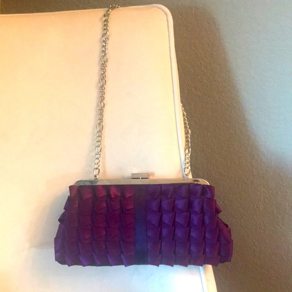 Jessica McClintock clutch on a silver chain.